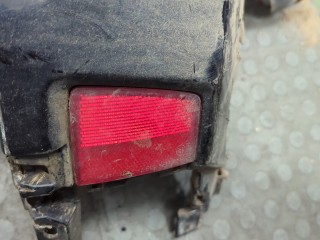 Клык бампера правый задний, ориг. номер 6410B634XA, Mitsubishi Pajero 2006-2011