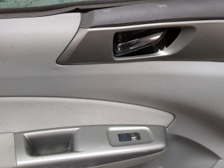 Замок двери левый передний, ориг. номер 61032SC310, Subaru Forester (S12) 2007-2011