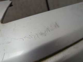 Заглушка буксировочного крюка передняя, ориг. номер MN105768XA, Mitsubishi Colt 2002-2012