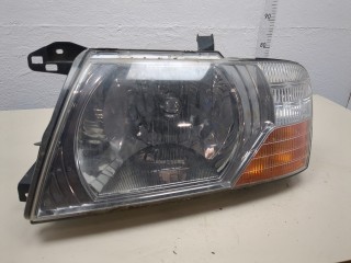 Фара (передняя) левая, Mitsubishi Pajero 2002-2006