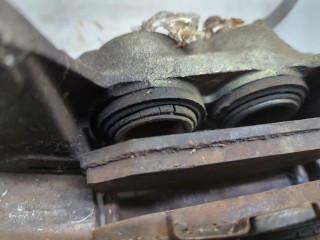 Суппорт левый передний, ориг. номер 26292FE050, Subaru Impreza 2002-2005