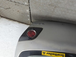 Замок багажника, Mazda 3 2006-2009