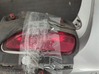 Фонарь противотуманный левый Opel Zafira 2008-2014