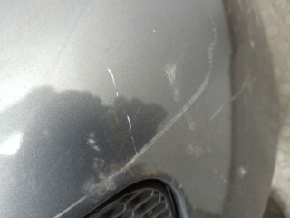 Заглушка (решетка) бампера левая передняя, Nissan Almera 2002-2006