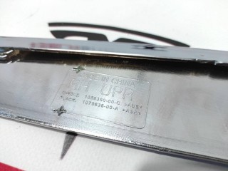 Накладка люверсы, ориг. номер 1056380-00-C, Tesla Model S 2016-2021