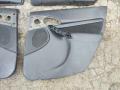 Обшивка двери передней левой (дверная карта) Ford Focus 2001г. - фото №10