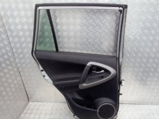 Обшивка двери задняя левая, ориг. номер 6764042330B0, Toyota Rav 4 (XA30)