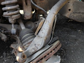 Кулак поворотный левый Nissan Pathfinder (R51M) Внедорожник 2004-2010, 40015EB000