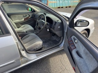 Замок двери, ориг. номер 80553AA210, 82503AA210, 825072Y000, NISSAN CEFIRO 1997-2000