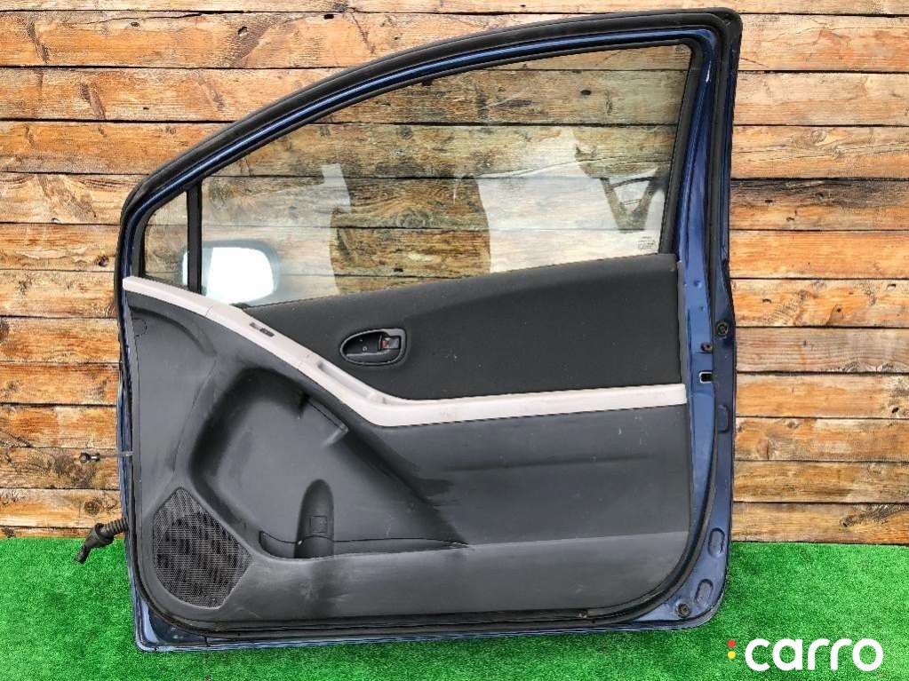Обшивка двери передней правой (дверная карта) Toyota Yaris 2005-2009, хетчбэк 5 дв., левый руль, фото 1