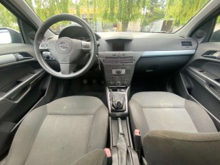 Обшивка двери передней правой (дверная карта), Opel Astra 1998-2009