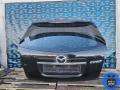 Накладка подсветки номера Mazda CX7 2008г. - фото №2
