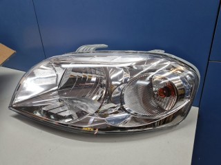 Фара левая, ориг. номер SHF12070, Chevrolet Aveo T250 2006-2012