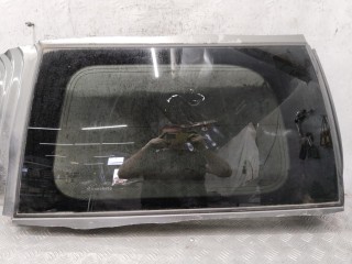 Стекло кузовное боковое левое Nissan Pathfinder 2004-2010, левый руль