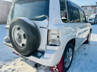 подкрылок, ориг. номер 5476, MR566399, MITSUBISHI PAJERO IO 1998-2000