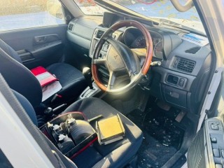 подкрылок, ориг. номер 5476, MR566399, MITSUBISHI PAJERO IO 1998-2000