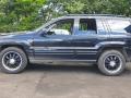 Jeep Grand Cherokee 2 поколение [рестайлинг] 2004г. 4.0 л., ERH - фото №4