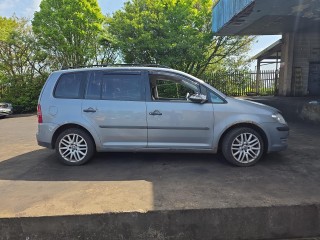 Volkswagen Touran 1 поколение [рестайлинг] 2010г. 1.9 л., BXE - фото №5