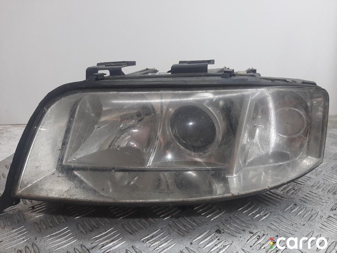 фара левая Audi A6 C5 2001г. - фото №1