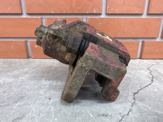 Суппорт передний левый, ориг. номер MR569125, Mitsubishi Lancer Cedia 2000-2003