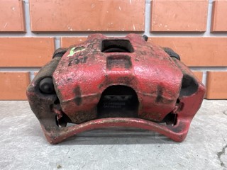 Суппорт передний левый, ориг. номер MR569125, Mitsubishi Lancer Cedia 2000-2003