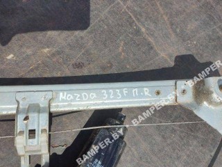 Стеклоподъемник электрический передний правый, ориг. номер 8621004294, Mazda 323F BJ