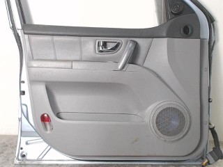 Обшивка двери передней левой (дверная карта) Kia Sorento 1 2006-2011