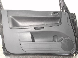 Обшивка двери передней левой (дверная карта) Mitsubishi Colt 6 restailing 2002-2012