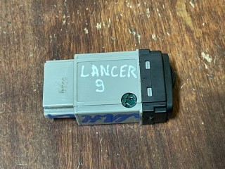 Кнопка корректора фар, Mitsubishi Lancer 9