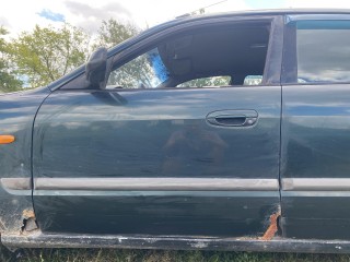 Дверь передняя левая Mazda 626 GF 1997-1999, хетчбэк 5 дв.