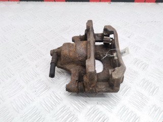 Суппорт передний левый, ориг. номер 477500H010, Toyota Aygo 2005-2008