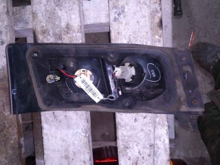 Фонарь крышки багажника левый, ориг. номер MR325947, Mitsubishi Galant 1996-1999