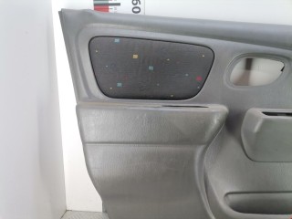 Обшивка двери передней левой (дверная карта), Suzuki Alto 1998-2012