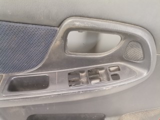 Обшивка двери передней левой (дверная карта), ориг. номер 94235FE010, Subaru Impreza 1996-2000
