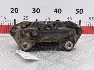 Суппорт передний левый, ориг. номер 477500K071, Toyota Hilux 2005-2008