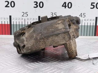 Суппорт передний левый, ориг. номер 477500K071, Toyota Hilux 2005-2008