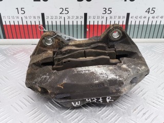 Суппорт передний левый, ориг. номер 477500K071, Toyota Hilux 2005-2008