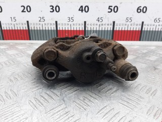 Суппорт передний правый, ориг. номер DCZ03398ZA, Mazda Demio 1996-1999