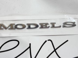 эмблема, ориг. номер 1474572-00-A, Tesla Model S 1 поколение [2-й рестайлинг] 2021-2026