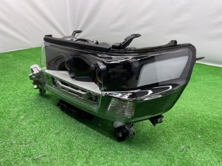 Фара AFS левая, ориг. номер TYL020410182L, Toyota Land Cruiser 200 2012-2015