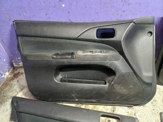 Обшивка двери (дверная карта) комплект, Mitsubishi Lancer 9 2003-2010