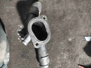 Фланец (тройник) системы охлаждения, ориг. номер 06A121133D, Volkswagen Golf 4 1997-2006