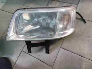 Фара левая Volkswagen Transporter T5 2002-2009