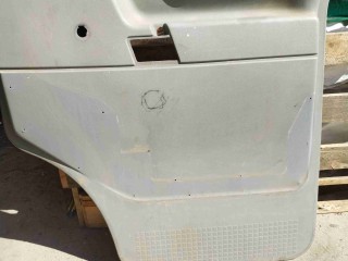 Обшивка двери передней правой (дверная карта) Volkswagen Transporter T4 1990-2003, левый руль, 701867106KD