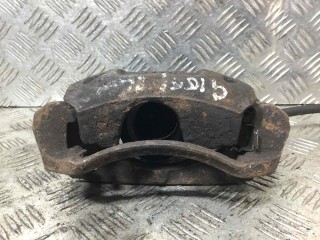 Суппорт передний левый, ориг. номер 477500H010, Toyota Aygo 2008-2012