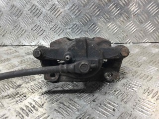 Суппорт передний левый, ориг. номер 477500H010, Toyota Aygo 2008-2012